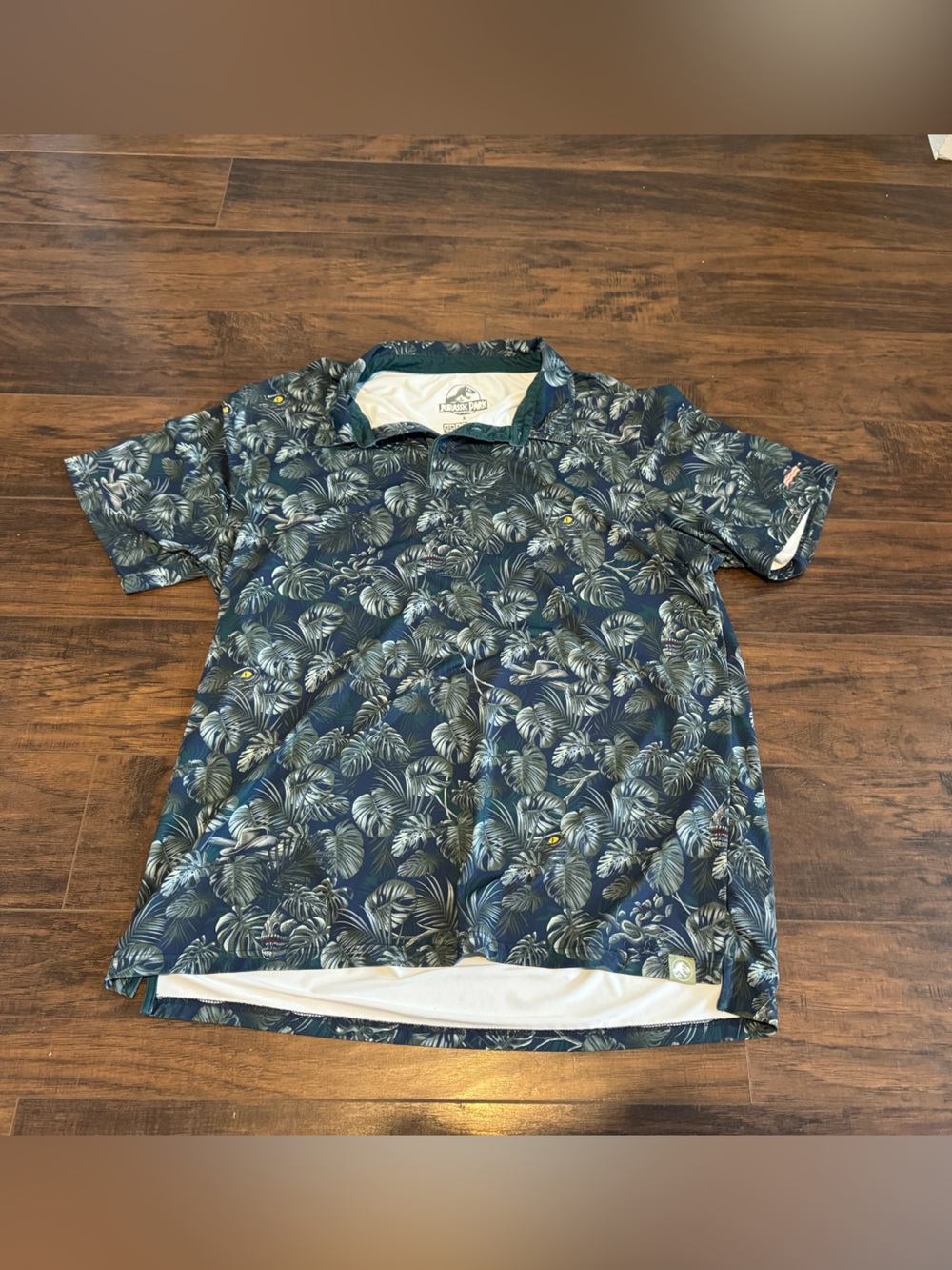 RSVLTS Men's Jurassic park and tropical leaf print polo
